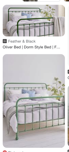 Sage green metal bedstead with …