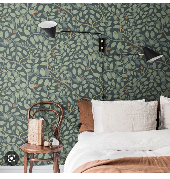 Sage green metal bedstead with …