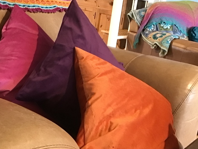 To put bright orange cushions on this sofa?