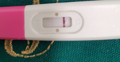 Very faint line 14 dpo