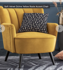 What colour armchair  in this kitchen?