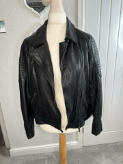 Leather biker jacket - brand and sizing help (Vinted)