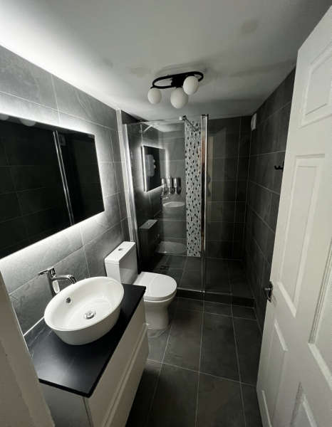 How much of bathroom walls should be tiled?