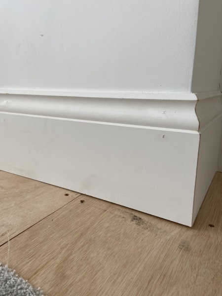 Vinyl floor fitting soon but slightly raised skirting in places?