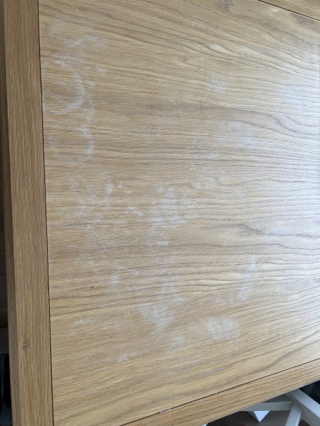 Water/heat marks on oak table