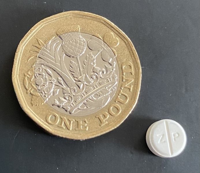 any pharmacists (or anyone) able to identify these pills?