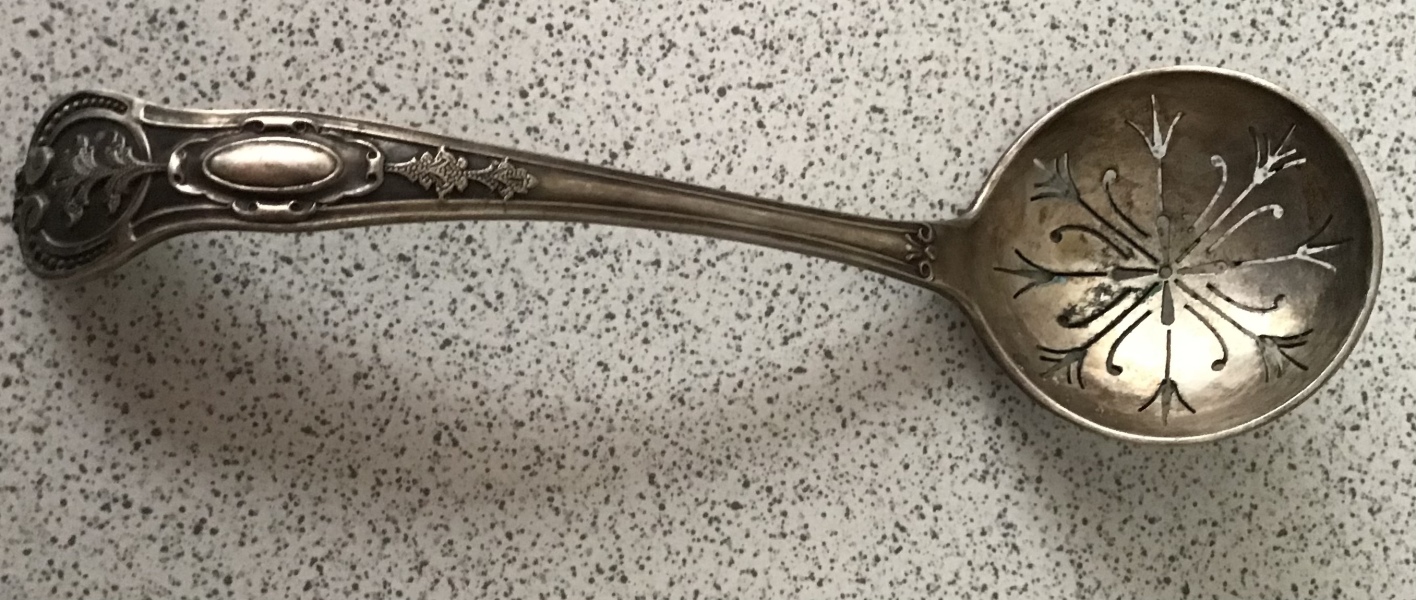 We inherited a tiny butter knife with its own sheath