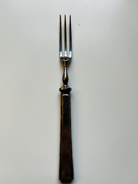 We inherited a tiny butter knife with its own sheath