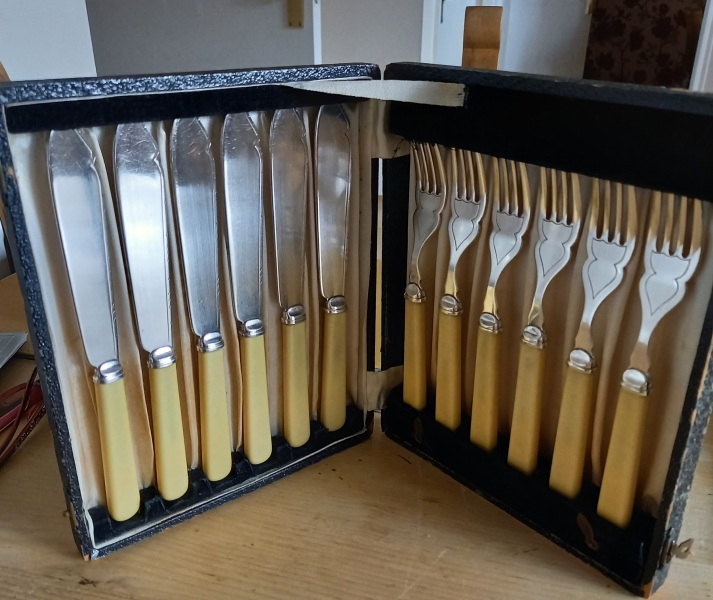 We inherited a tiny butter knife with its own sheath