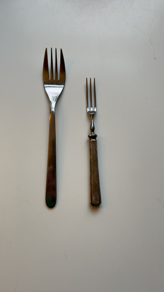 We inherited a tiny butter knife with its own sheath