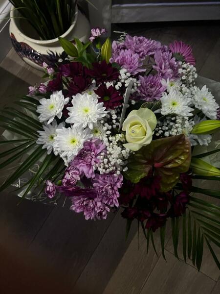 To call the florist and ask for a fresh bunch of flowers