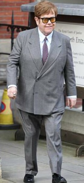 What's Elton got under his suit?