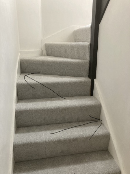 Dark skirting black next to charcoal