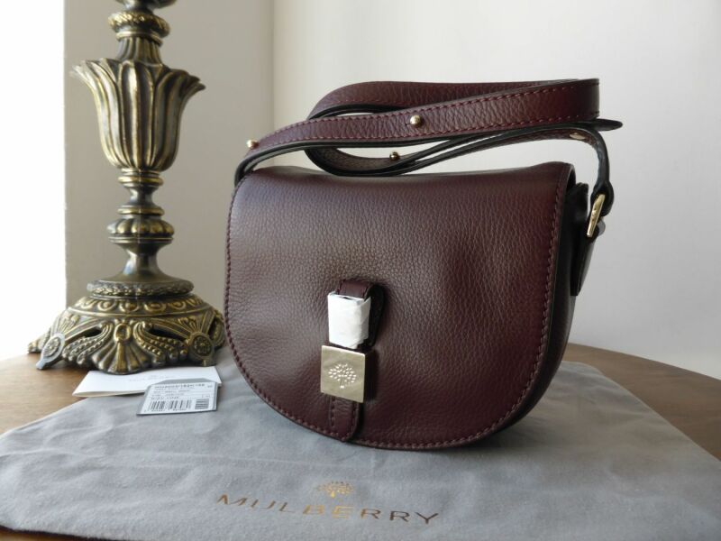 Why do people buy designer bags/shoes?
