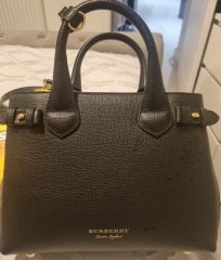 Why do people buy designer bags/shoes?