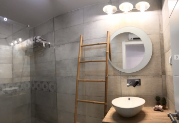 How much of bathroom walls should be tiled?