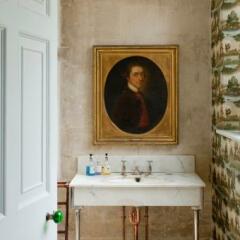 Putting a Landseer painting in a modern bathroom