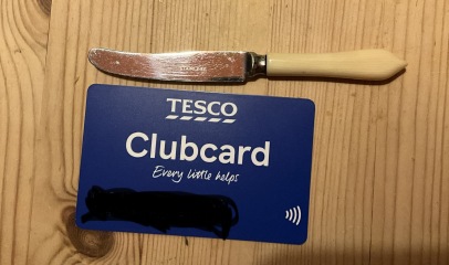 We inherited a tiny butter knife with its own sheath