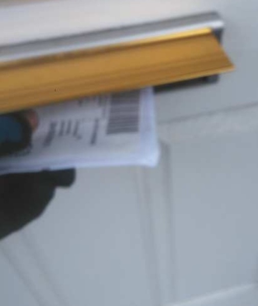 AIBU for being really annoyed at DHL for posting my passport through the wrong letterbox? 
