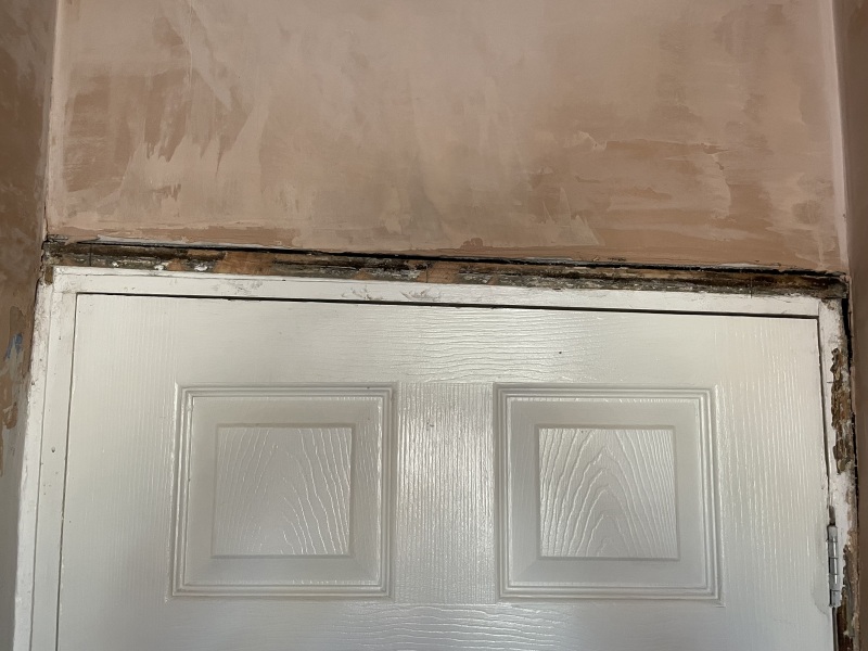 What is this top part of a door frame called? (Photo)