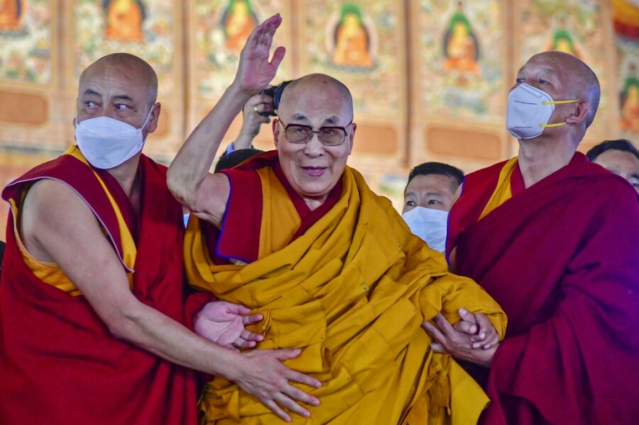 Dalai llama ask a child to suck his tongue