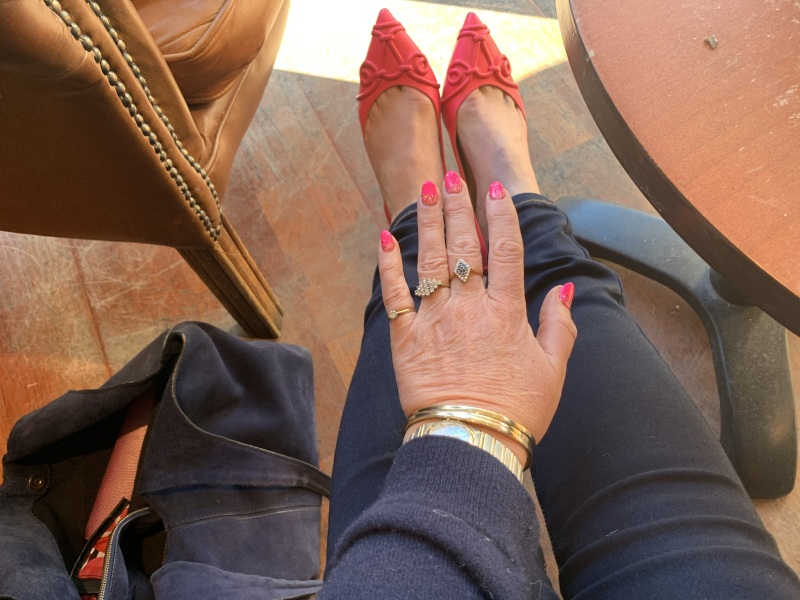 Why do people buy designer bags/shoes?