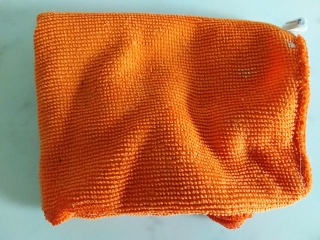 How to clean electric hob marked by burnt on 'nylon' cloth (pics attached)