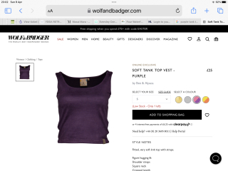 Purple vest top with wider straps so bra straps are not visible?
