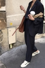 DH saying black suit + sneakers is not smart enough