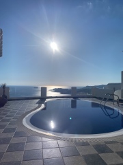 Can you recommend somewhere like my last holiday in Santorini please? 