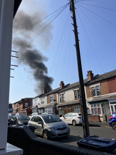Bonfire on sunny day