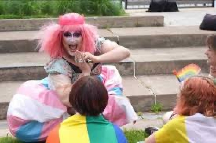 Clear distinction between DQ performances for consenting adults and inappropriate sexualised performances in front of children.