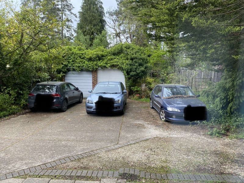 Another car parking one but one is abandoned