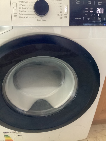 One Year old washing machine stinks badly and leaves clothes dirty.