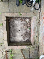 Drainage(?) Pit in Patio Help