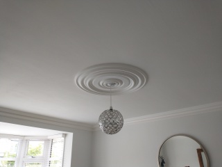 Will this chandelier go ok with this ceiling rose?