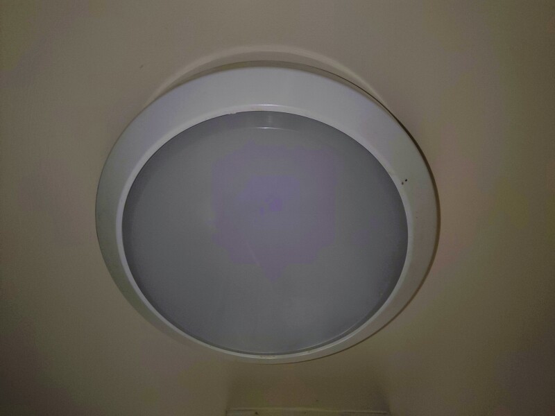 What is a standard bathroom light in a housing association property? 