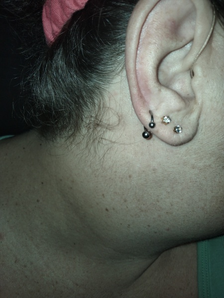 Ear piercing advice for hearing aid wearer. 