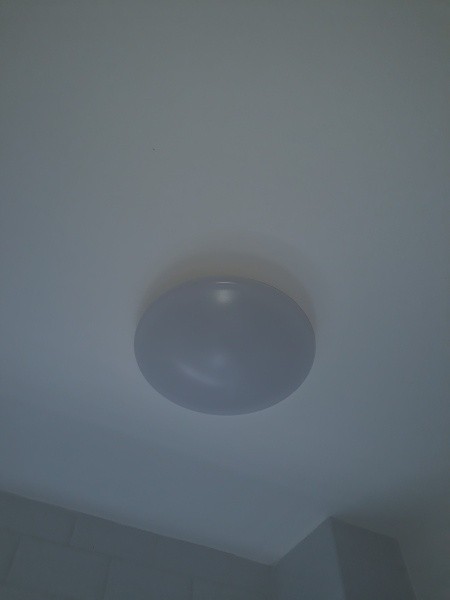 What is a standard bathroom light in a housing association property? 