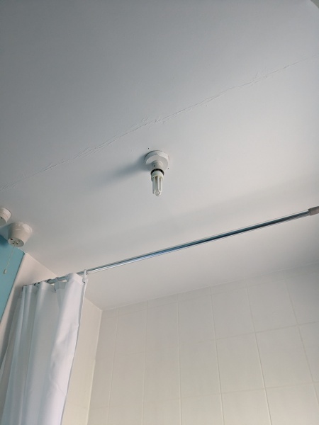 What is a standard bathroom light in a housing association property? 