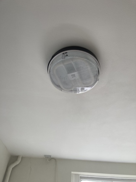 What is a standard bathroom light in a housing association property? 