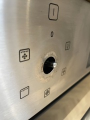 Cleaner has pulled oven dial out of the fitting - is this an easy fix? (Pics)