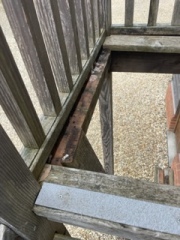 Upstairs landing of external stairs gave way and dh fell 10 feet. Report?