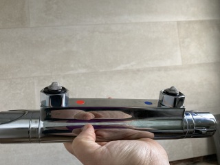 Please help shower fitting what is this piece