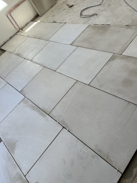 Stone floor or porcelain in kitchen. Pros and Cons