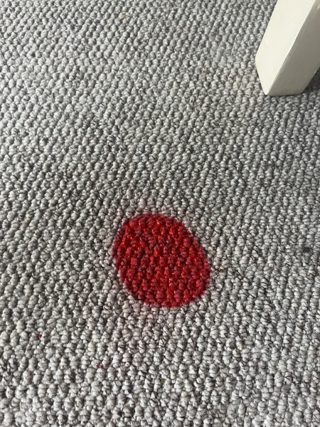 Red putty on the carpet. HELP