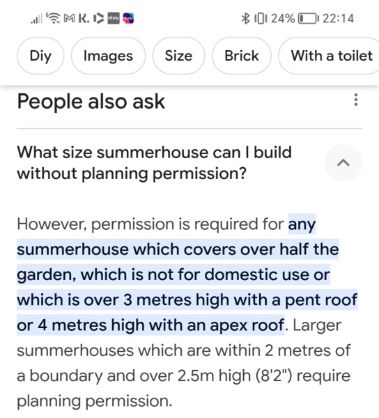 Next doors huge 2 story shed/summerhouse
