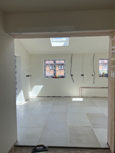 Stone floor or porcelain in kitchen. Pros and Cons