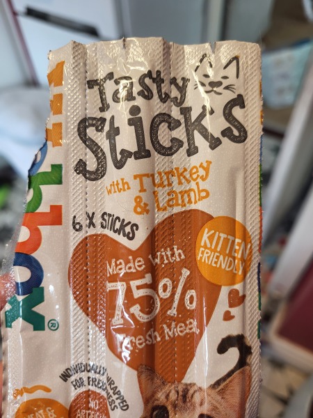 How can I disguise a tablet for a clever cat?