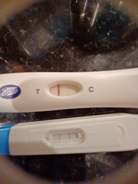 Test line darker than control line